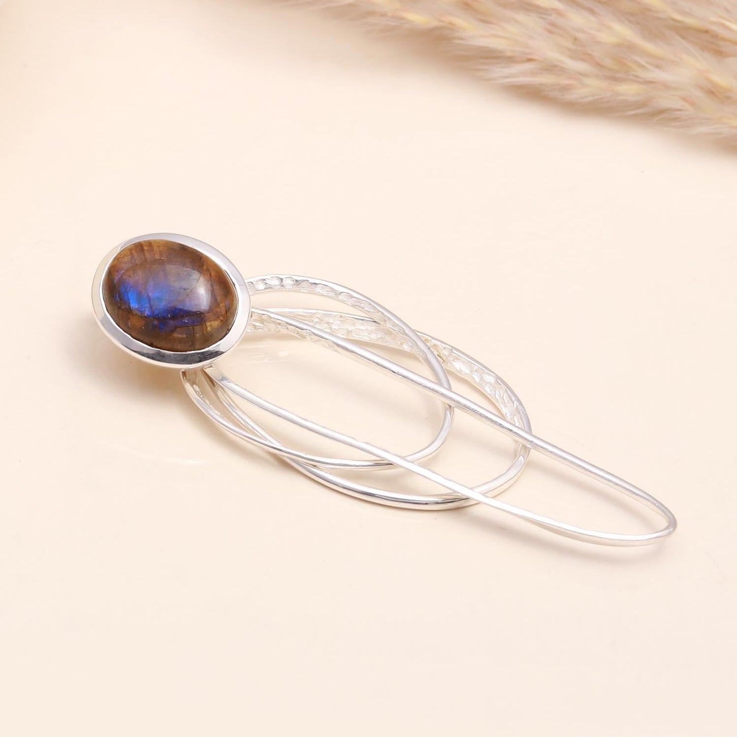 A 925 Sterling Silver Modern Art Labradorite Statement Pendant with a labradorite gemstone set in a silver frame, displayed against a neutral background.