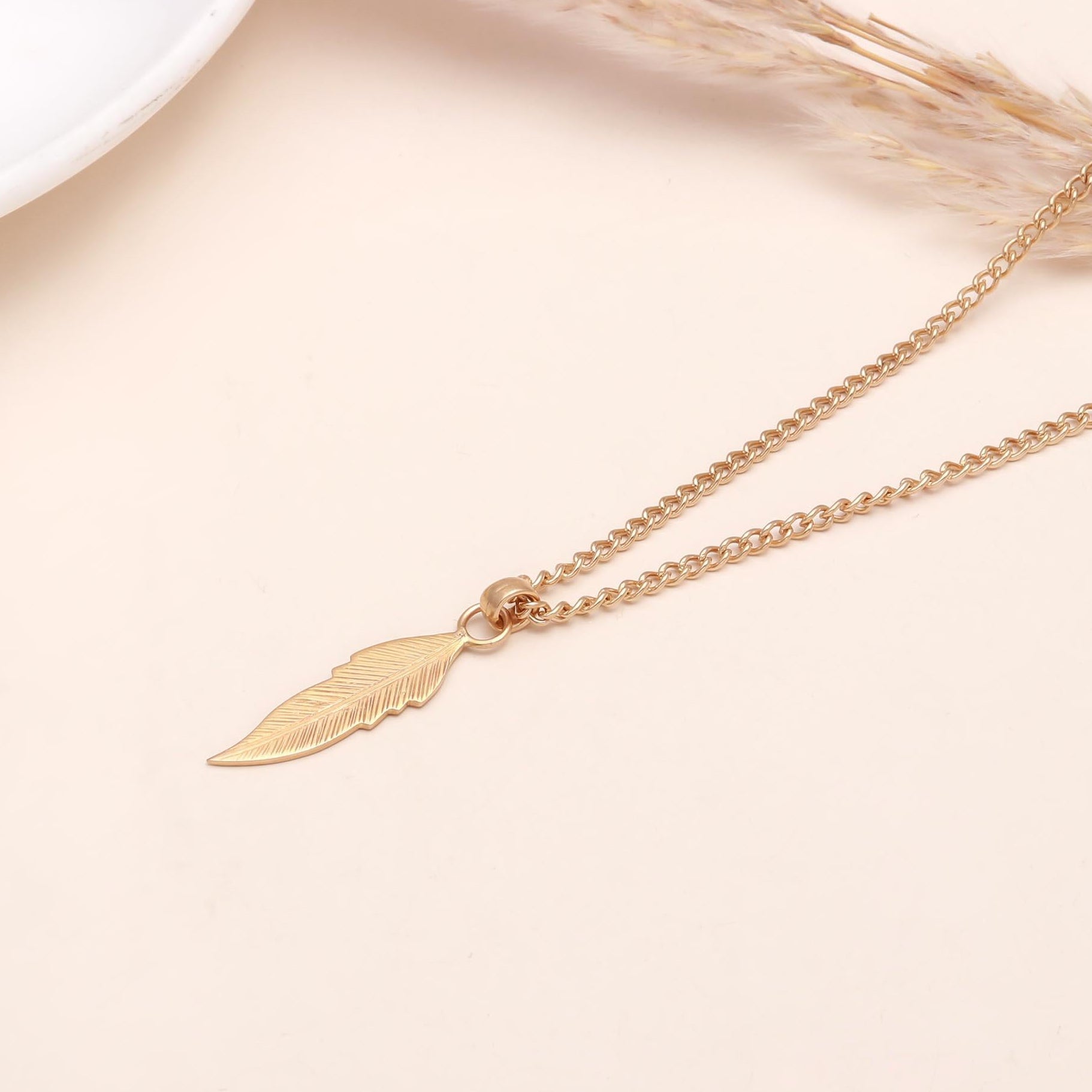The Golden Quill: Detailed Gold Leaf Feather Pendant