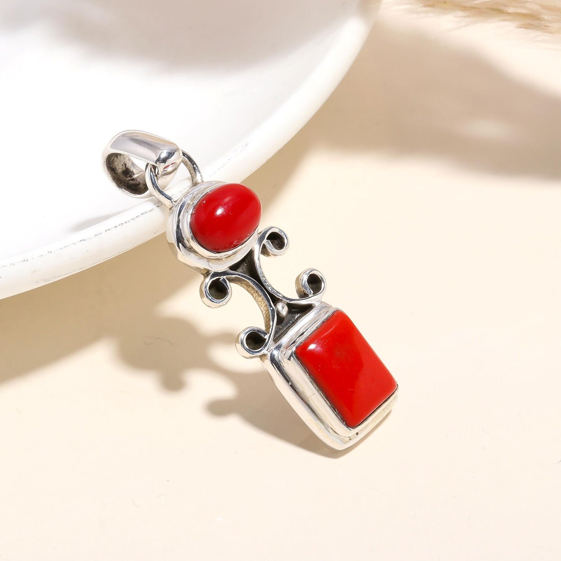 The Crimson Scrollwork: Vibrant Red Coral Pendant