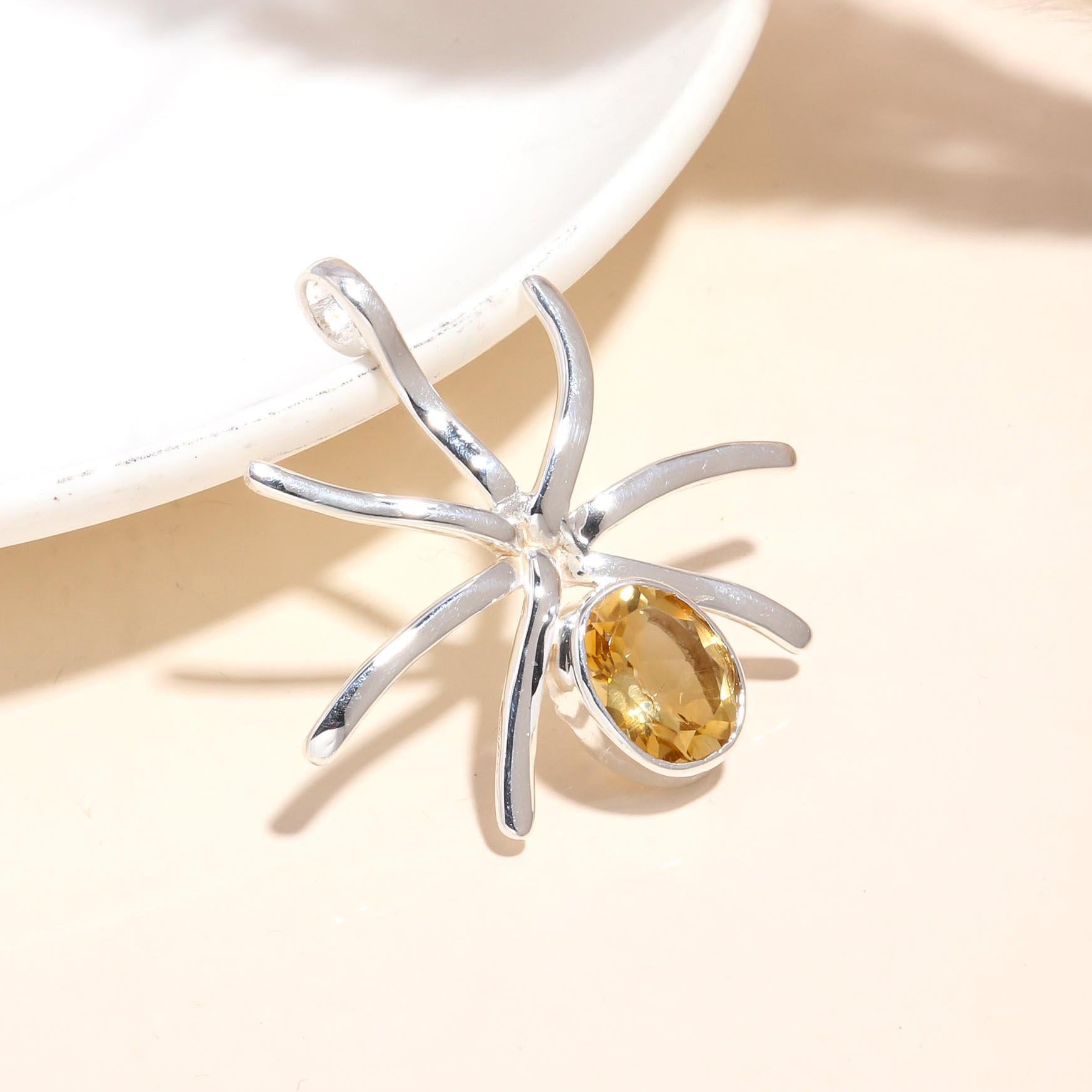The Citrine Spider: Whimsical Nature-Inspired Silver Pendant