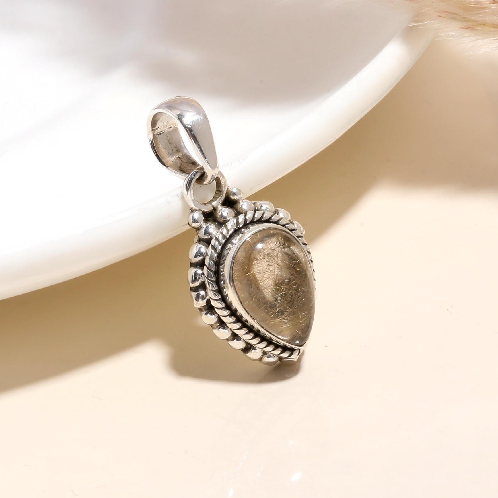 The Rutilated Teardrop: Braided Artisan Quartz Pendant