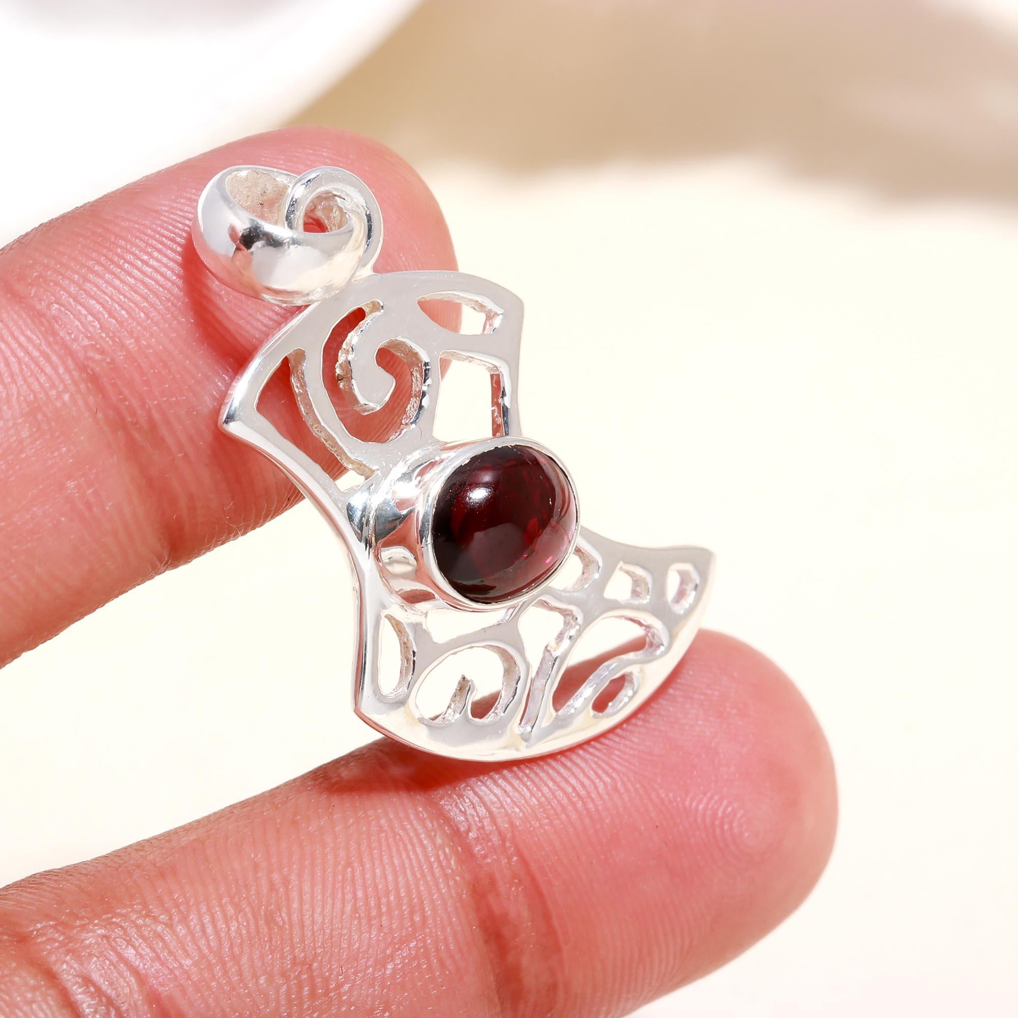 The Scroll Fan: Garnet Filigree Silver Pendant