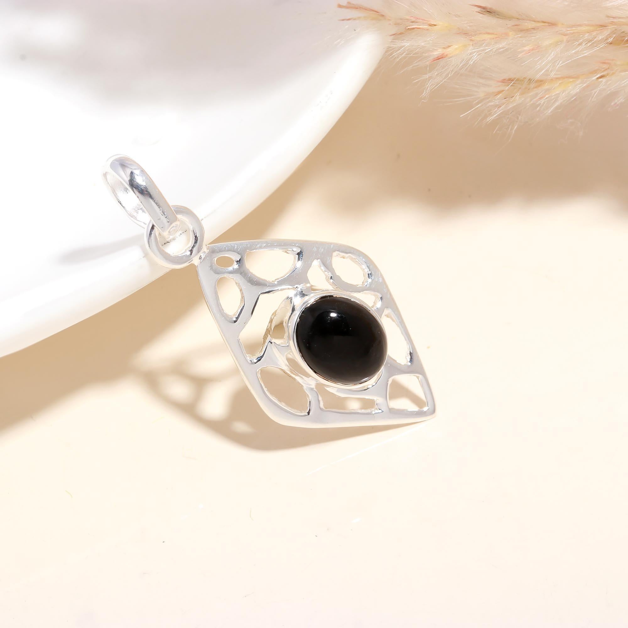 The Diamond Window: Black Onyx Filigree Pendant