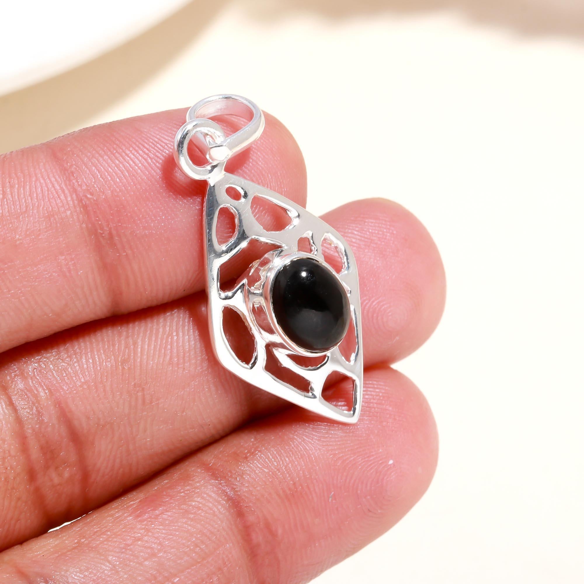 The Diamond Window: Black Onyx Filigree Pendant