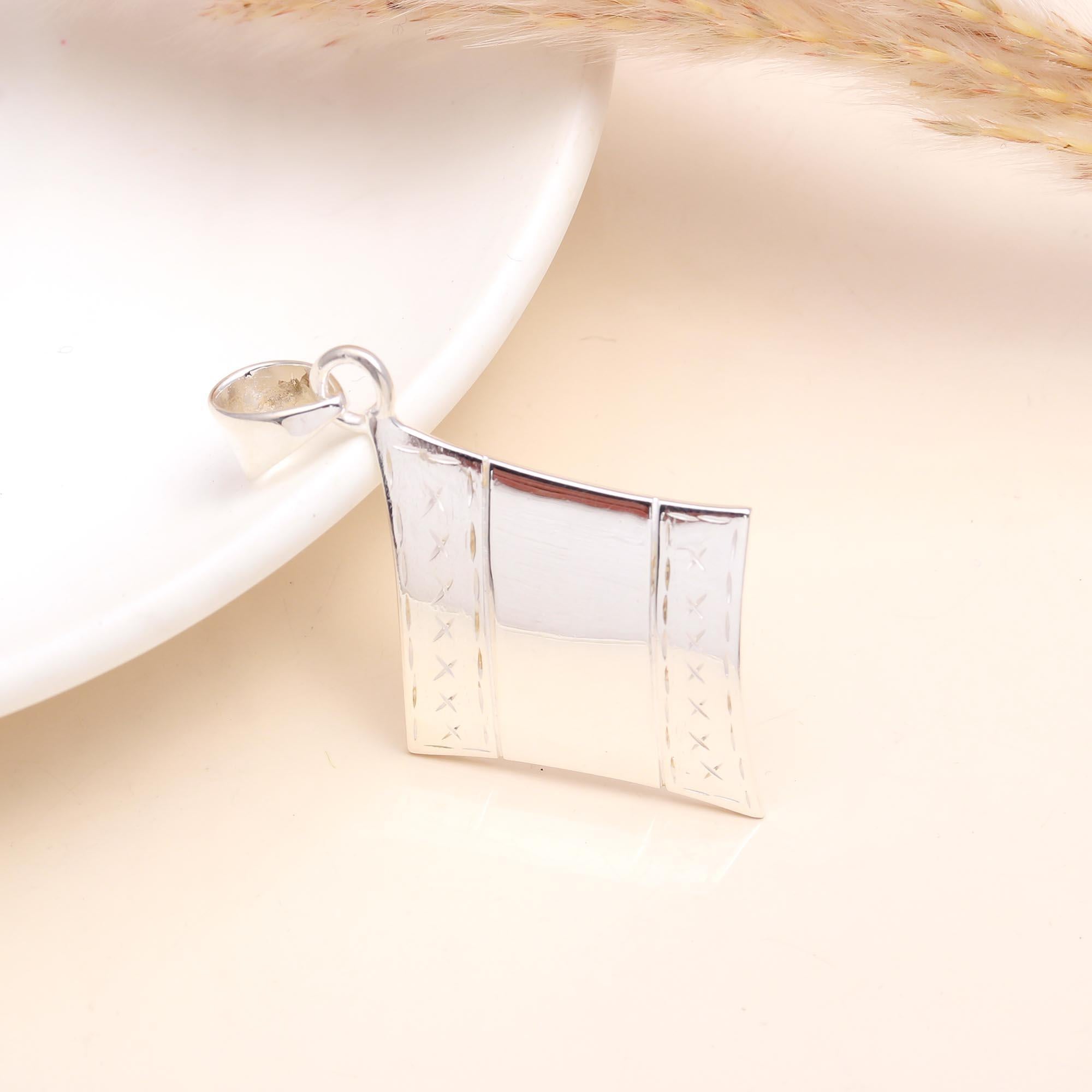The Silver Kite: Geometric Etched Silver Charm