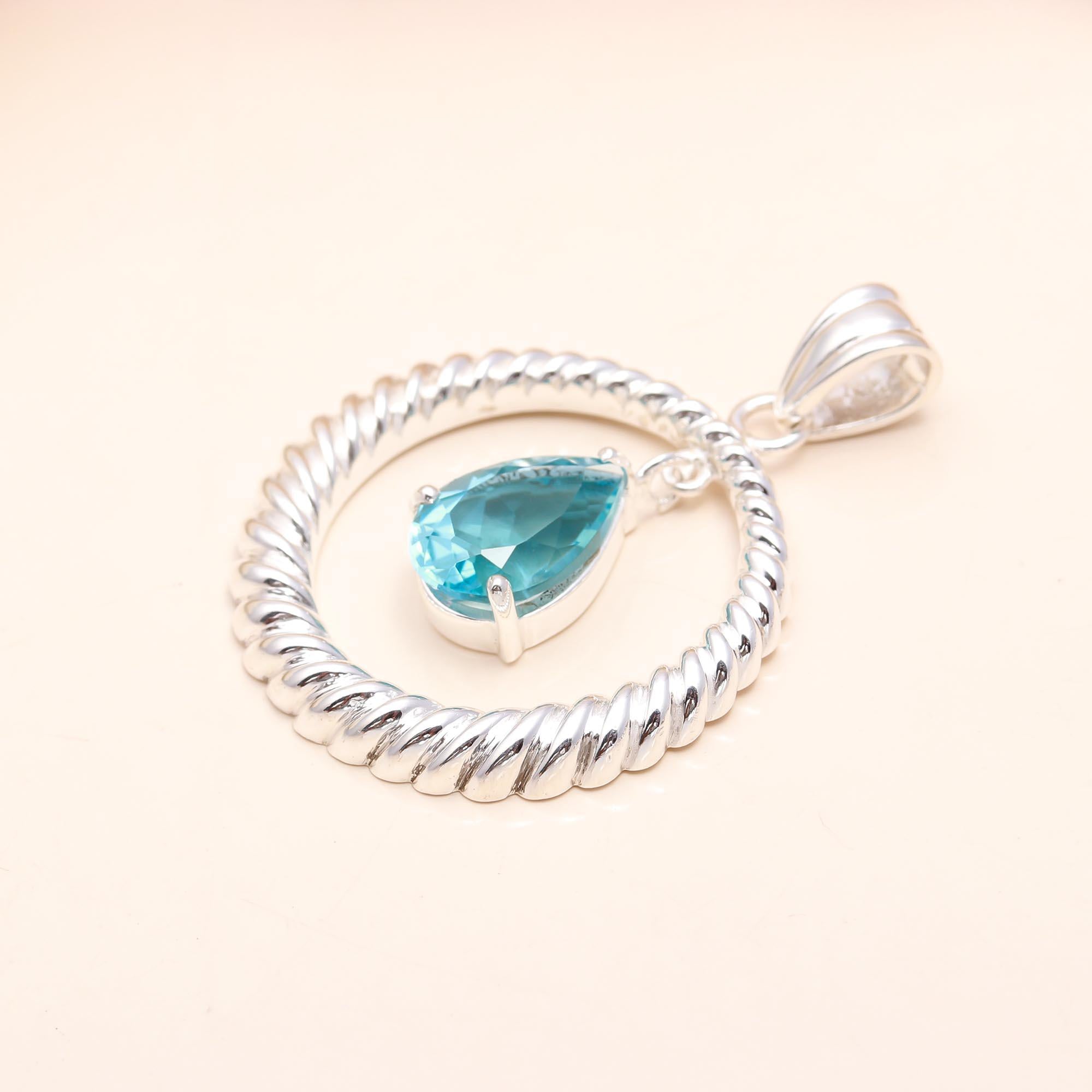 The Infinity Hoop: Blue Topaz Rope Pendant