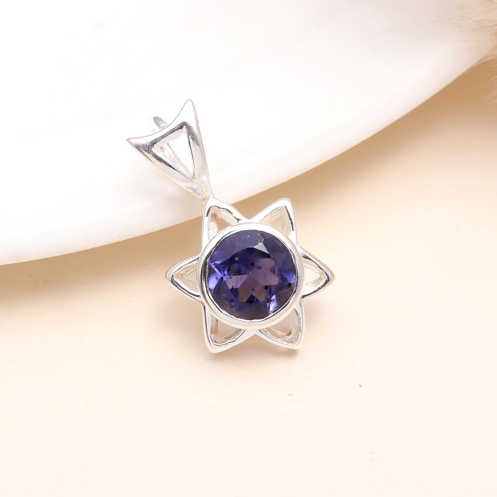 The Iolite Starburst: Celestial Silver Hexagon Pendant