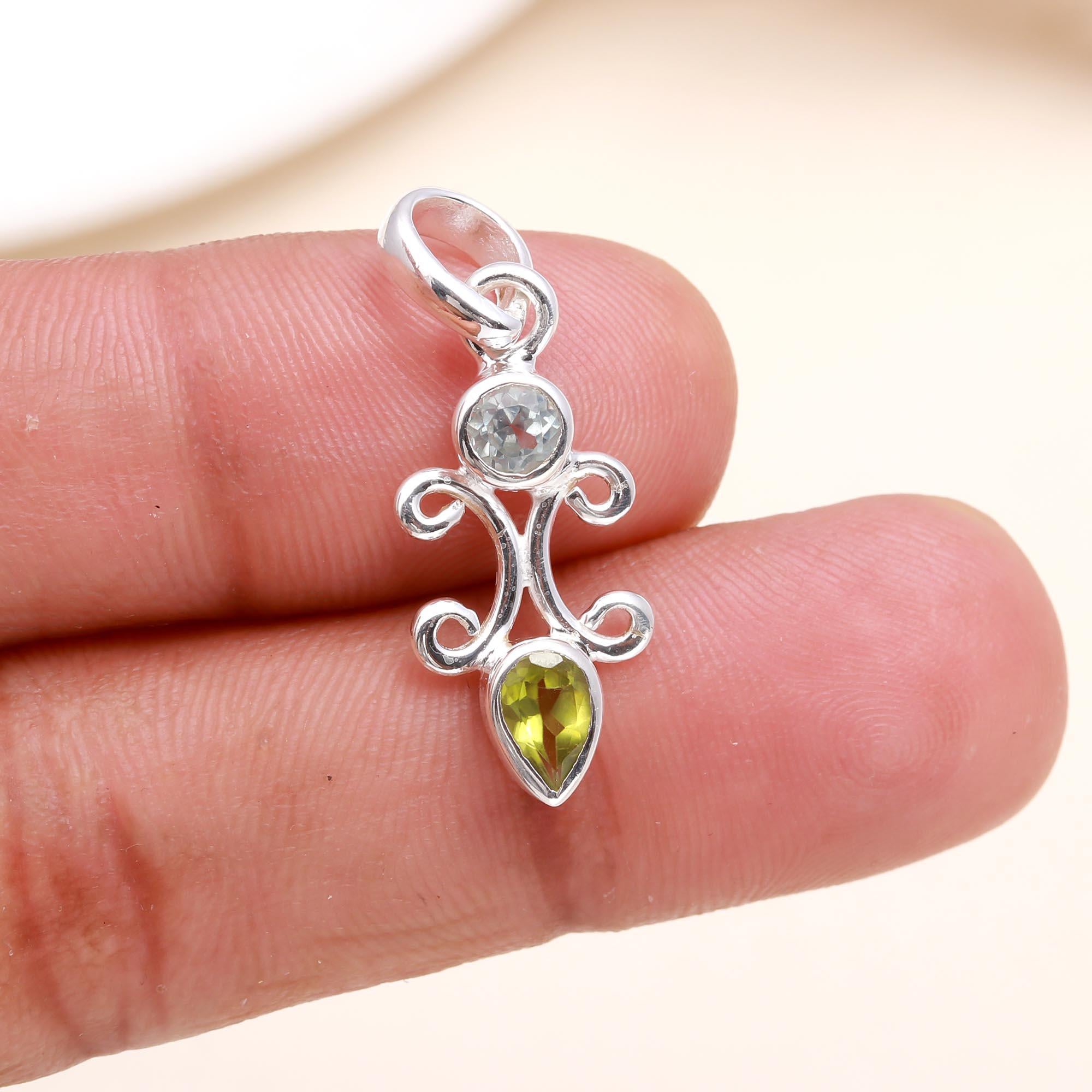 The Pastel Scroll: Silver Filigree Totem Pendant