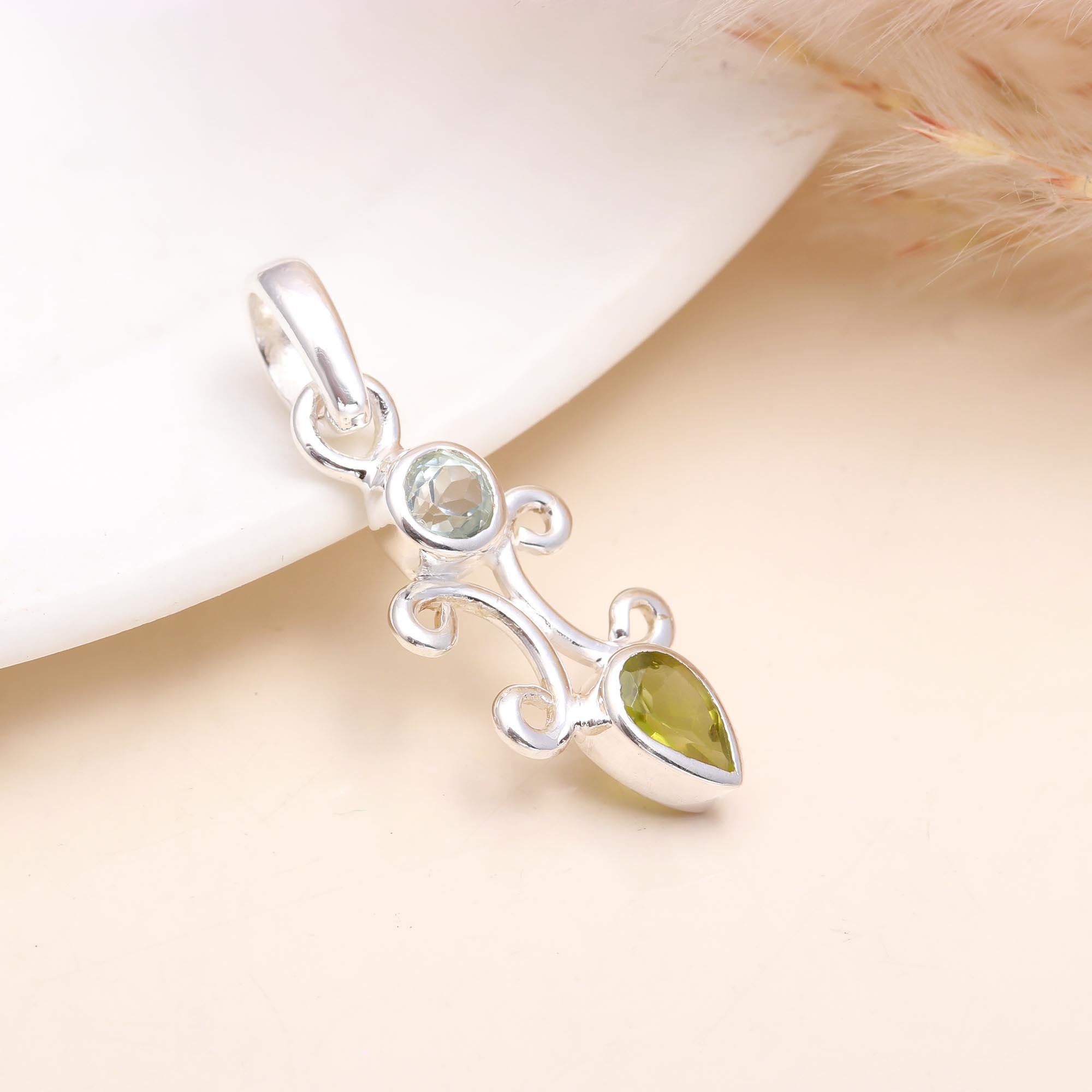 The Pastel Scroll: Silver Filigree Totem Pendant