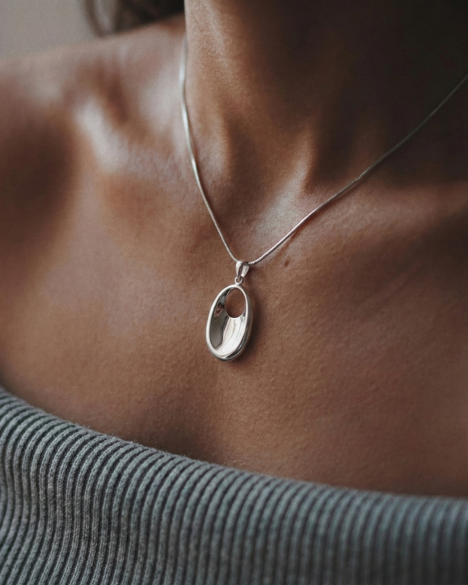 The Liquid Oval: Sculptural Sterling Silver Pendant