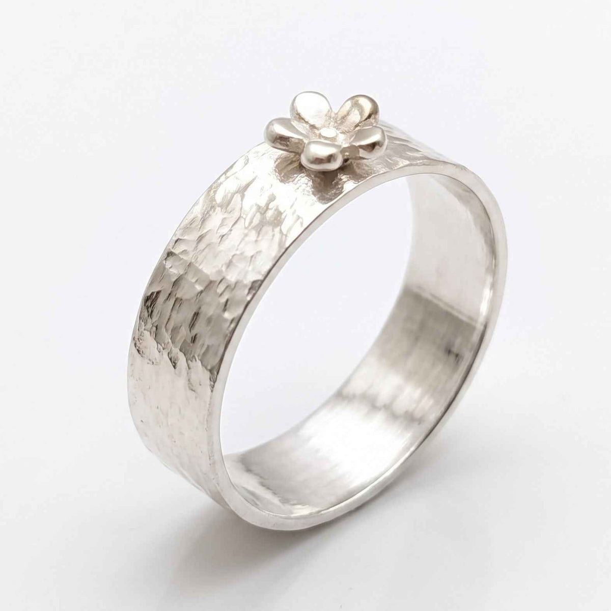 The Silver Bloom: Hammered Floral Wide Band Ring