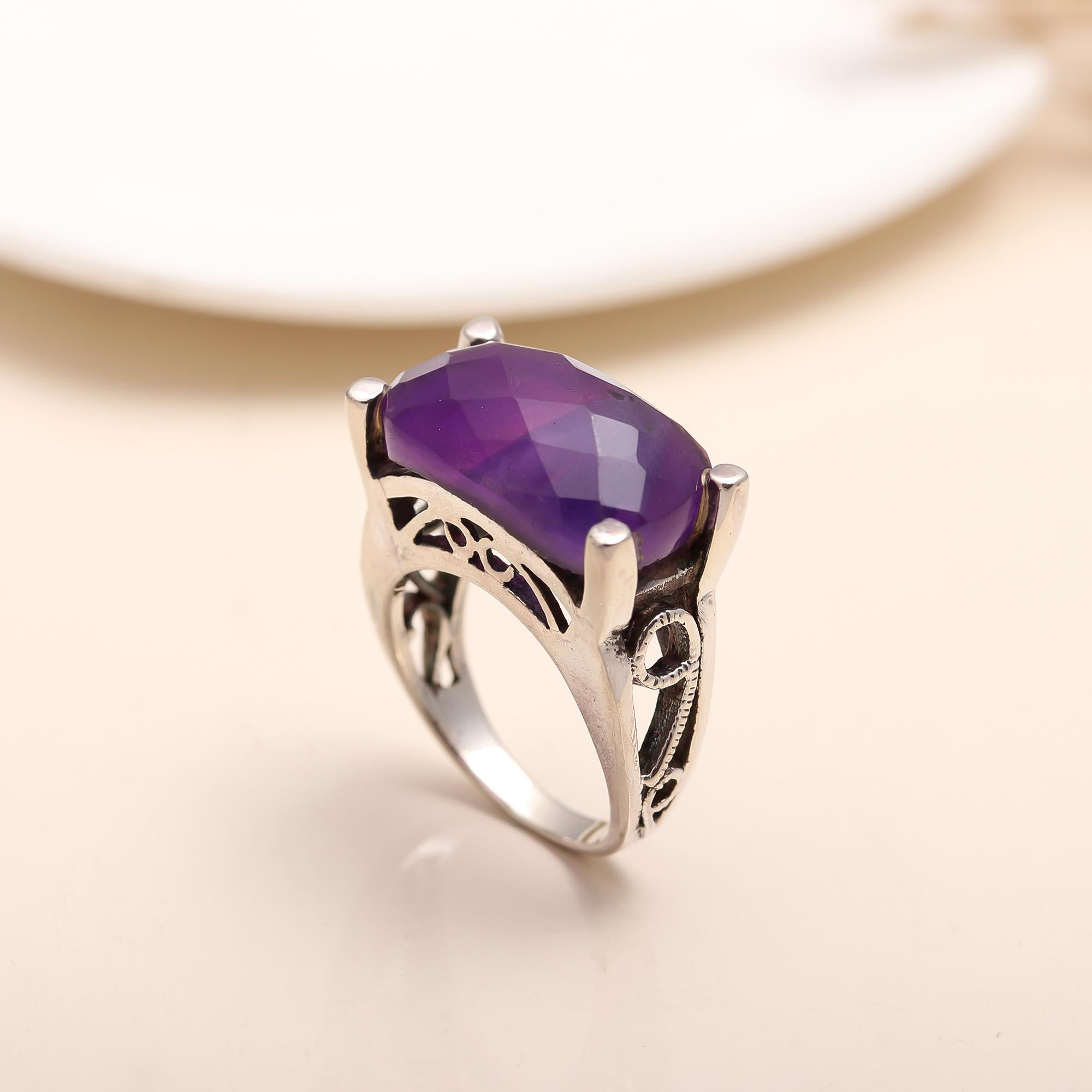 Handcrafted sterling silver ring featuring cushion-cut amethyst