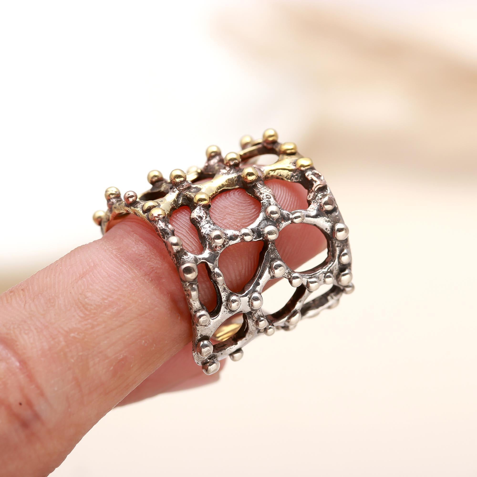 Dual-tone silver and gold openwork statement ring