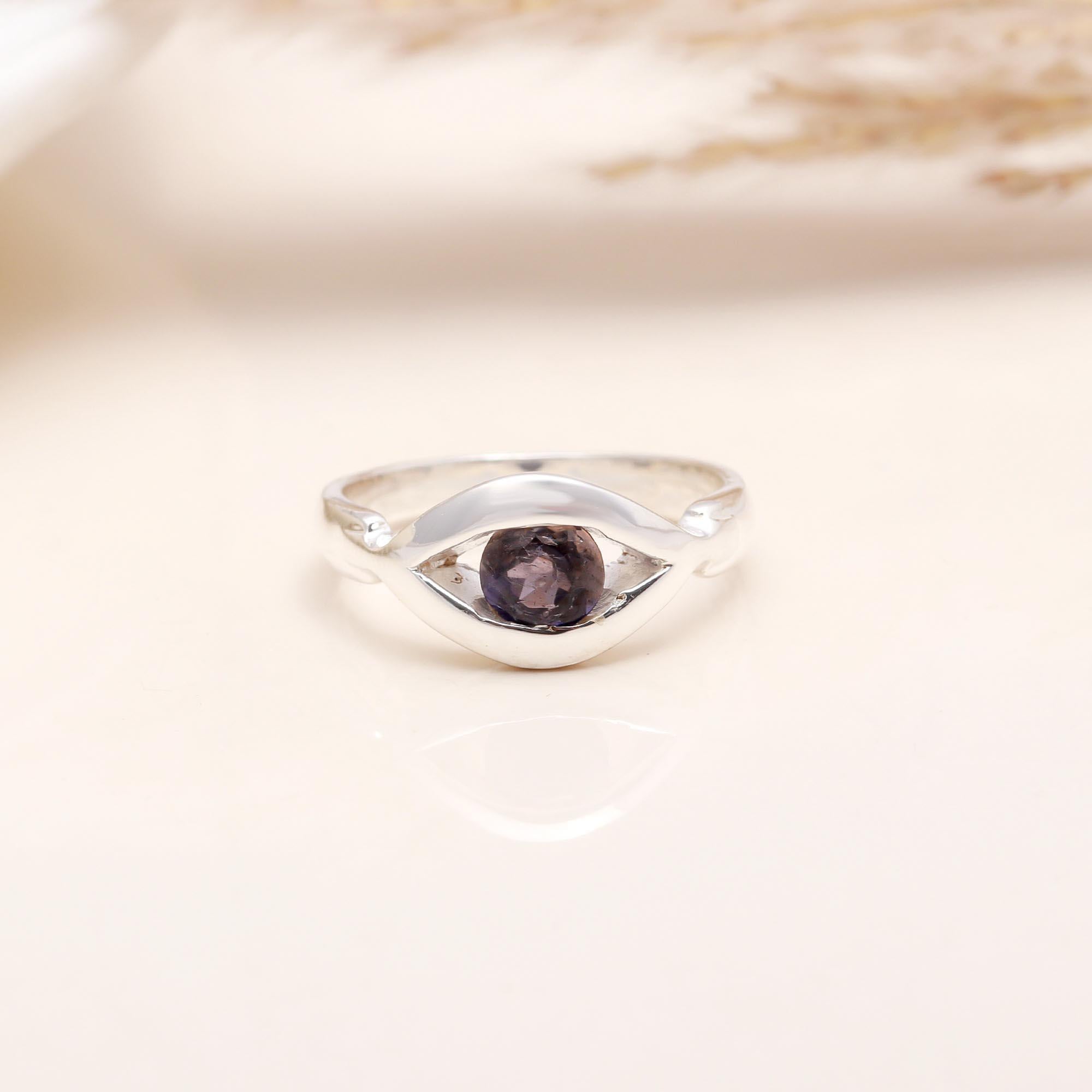 Sterling silver band with round iolite gemstone