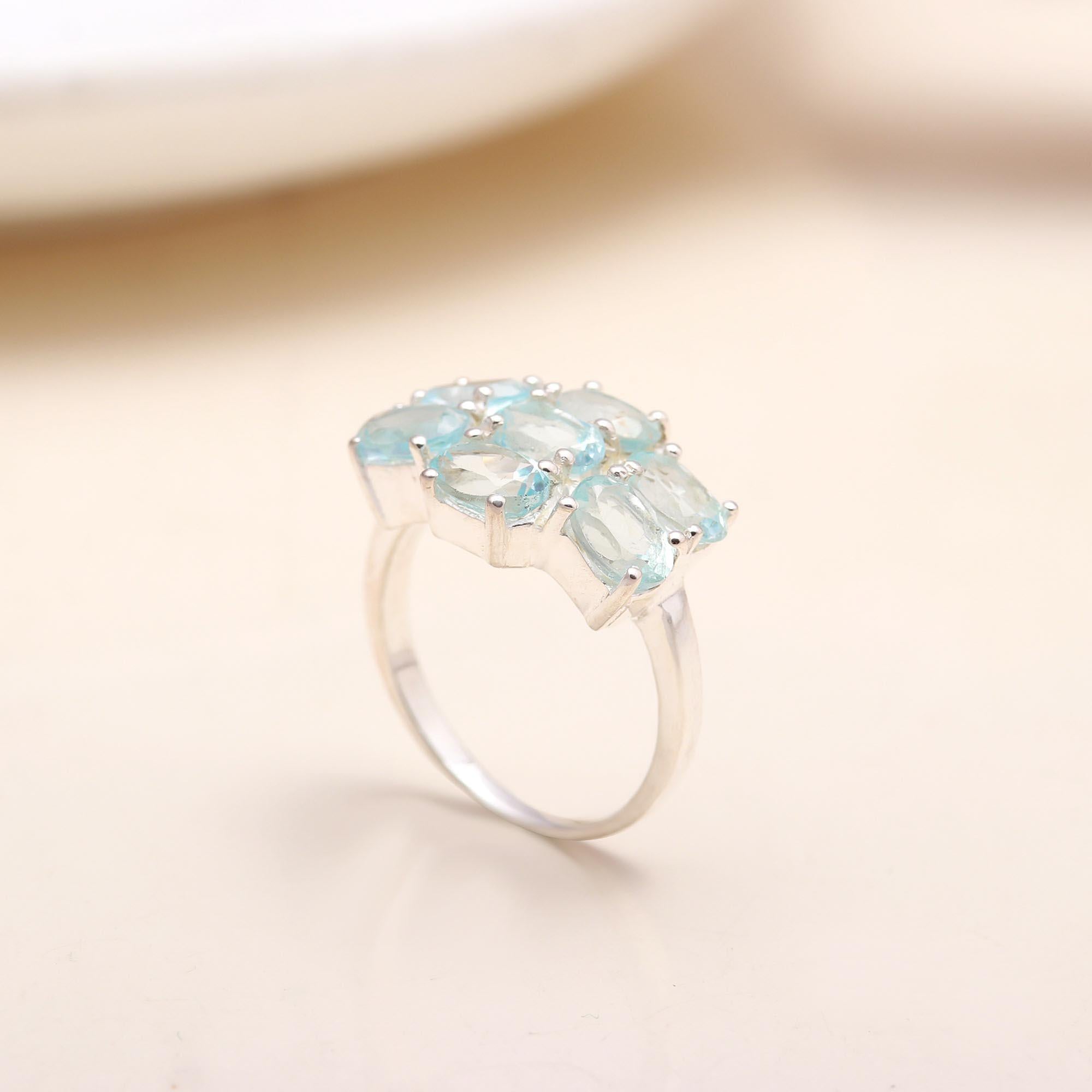 Handmade oval cut aquamarine sterling silver cluster ring