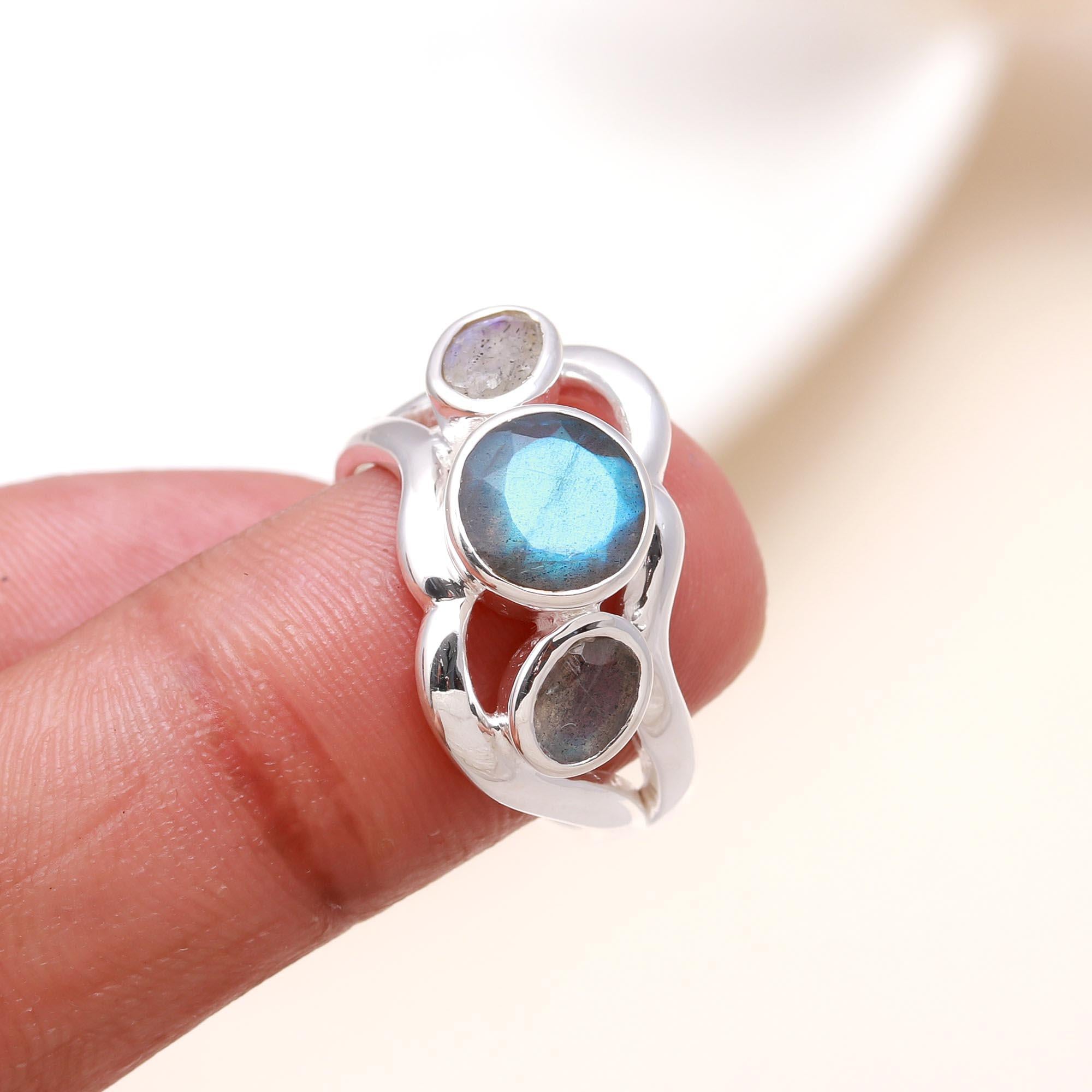 Elegant labradorite gemstone ring on finger