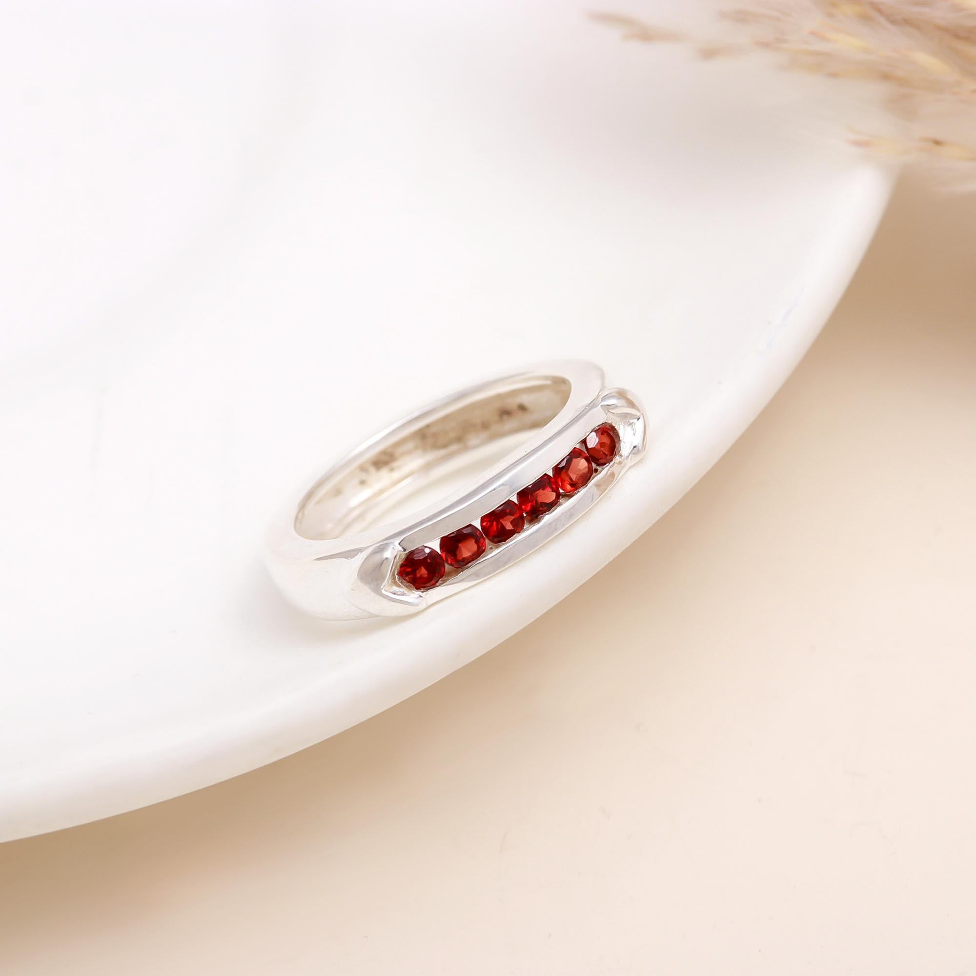The Red Path: Channel Set Garnet Eternity Style Ring