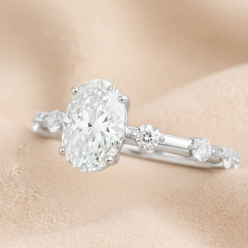 The Luminous Orbit: 1.2ct Oval Moissanite Accent Promise Ring