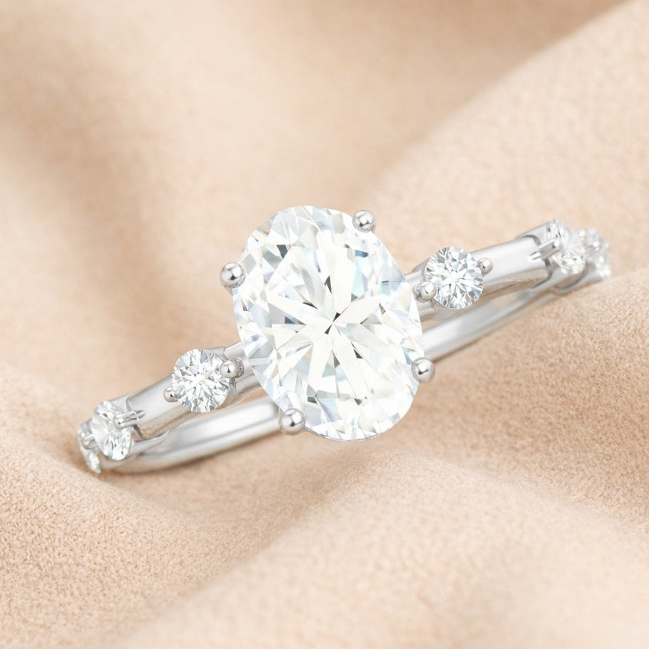 The Luminous Orbit: 1.2ct Oval Moissanite Accent Promise Ring