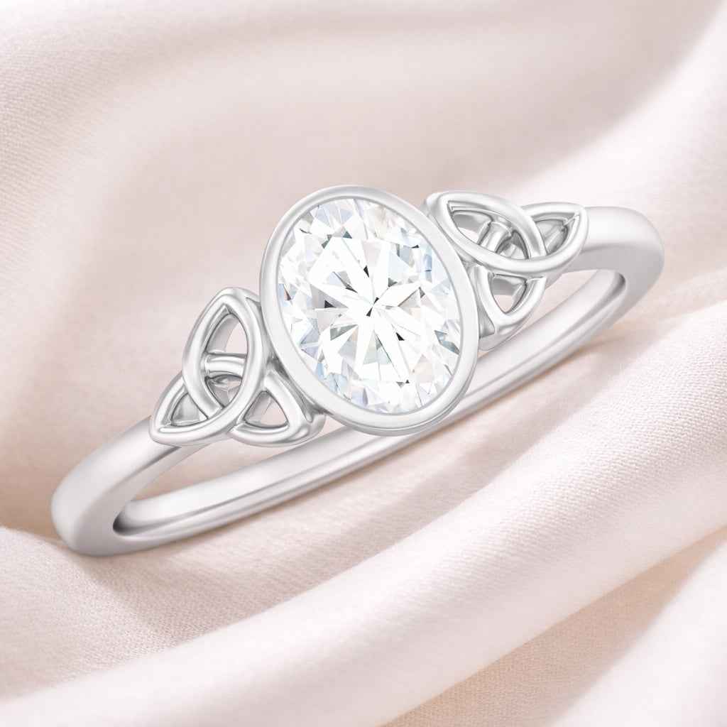 The Celtic Embrace: 1.2ct Oval Moissanite Bezel Ring