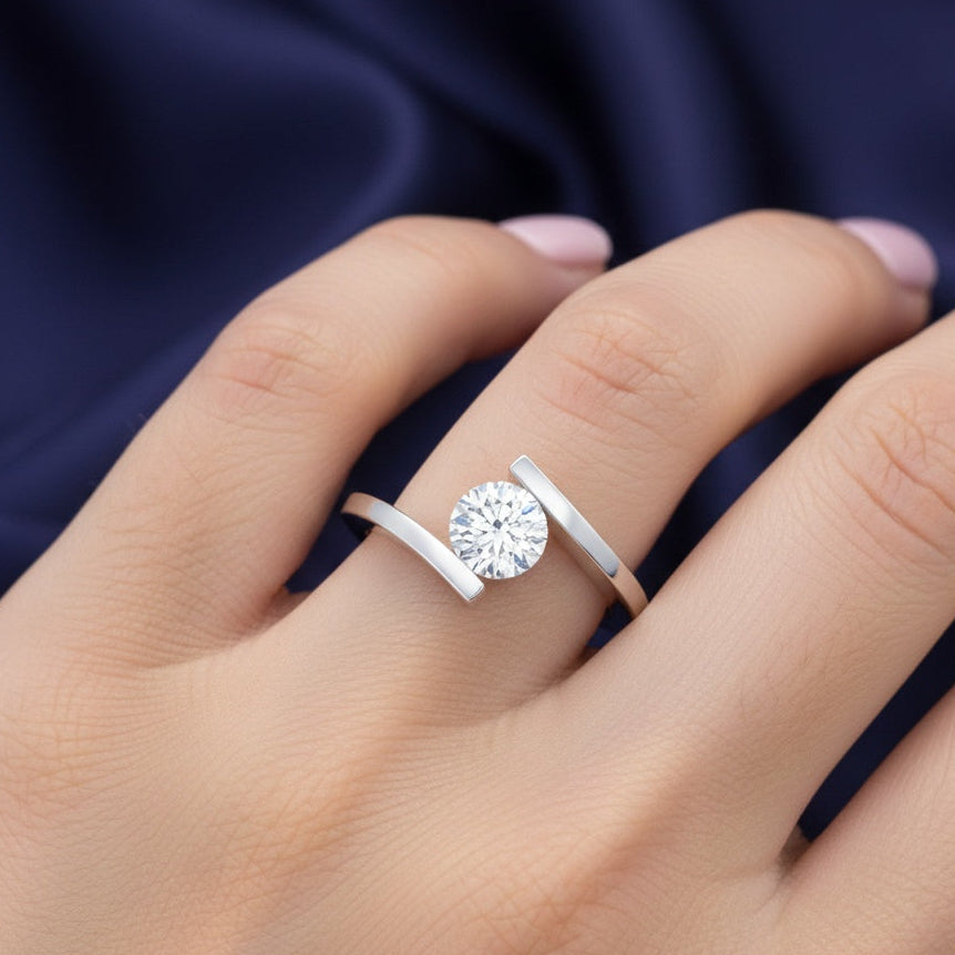 The Modern Embrace: 0.5ct Moissanite Tension Bypass Ring